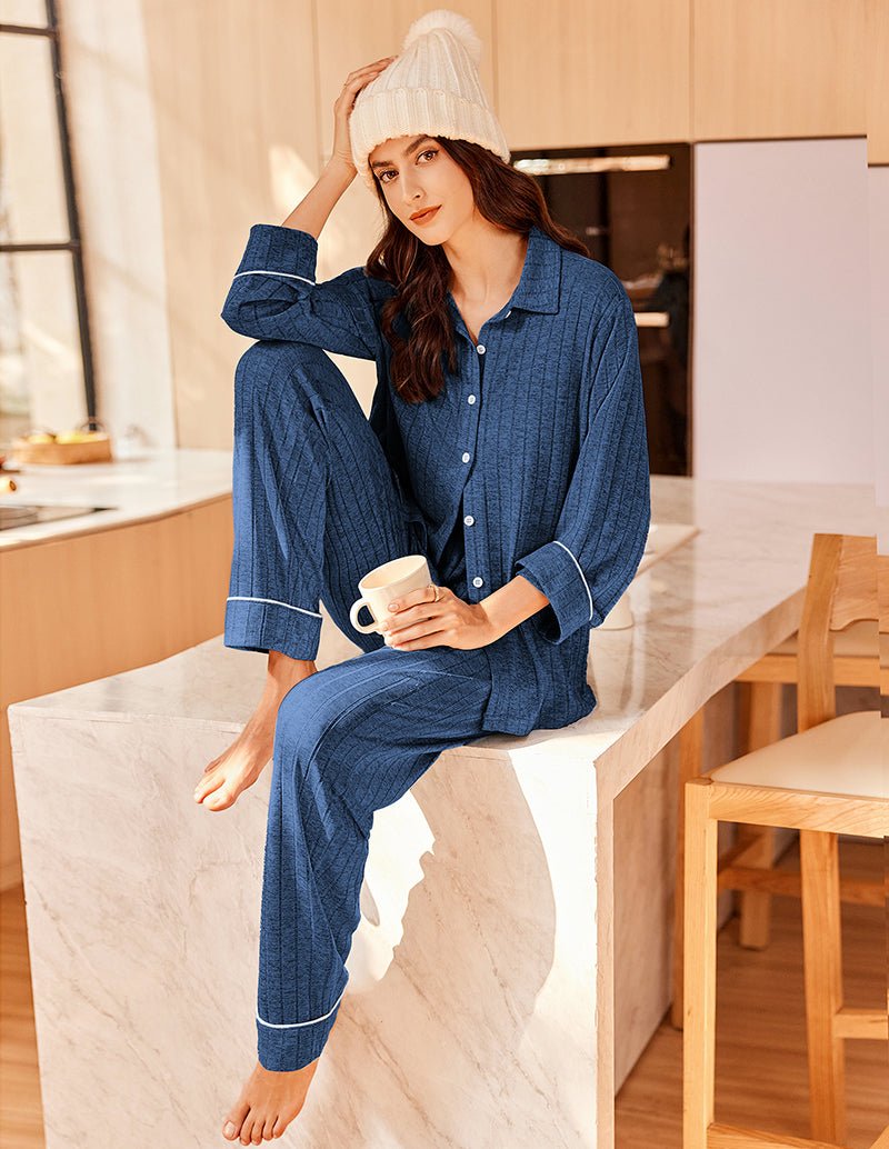 Navy blue ribbed pajama set, button-up shirt and cuffed pants with contrast piping