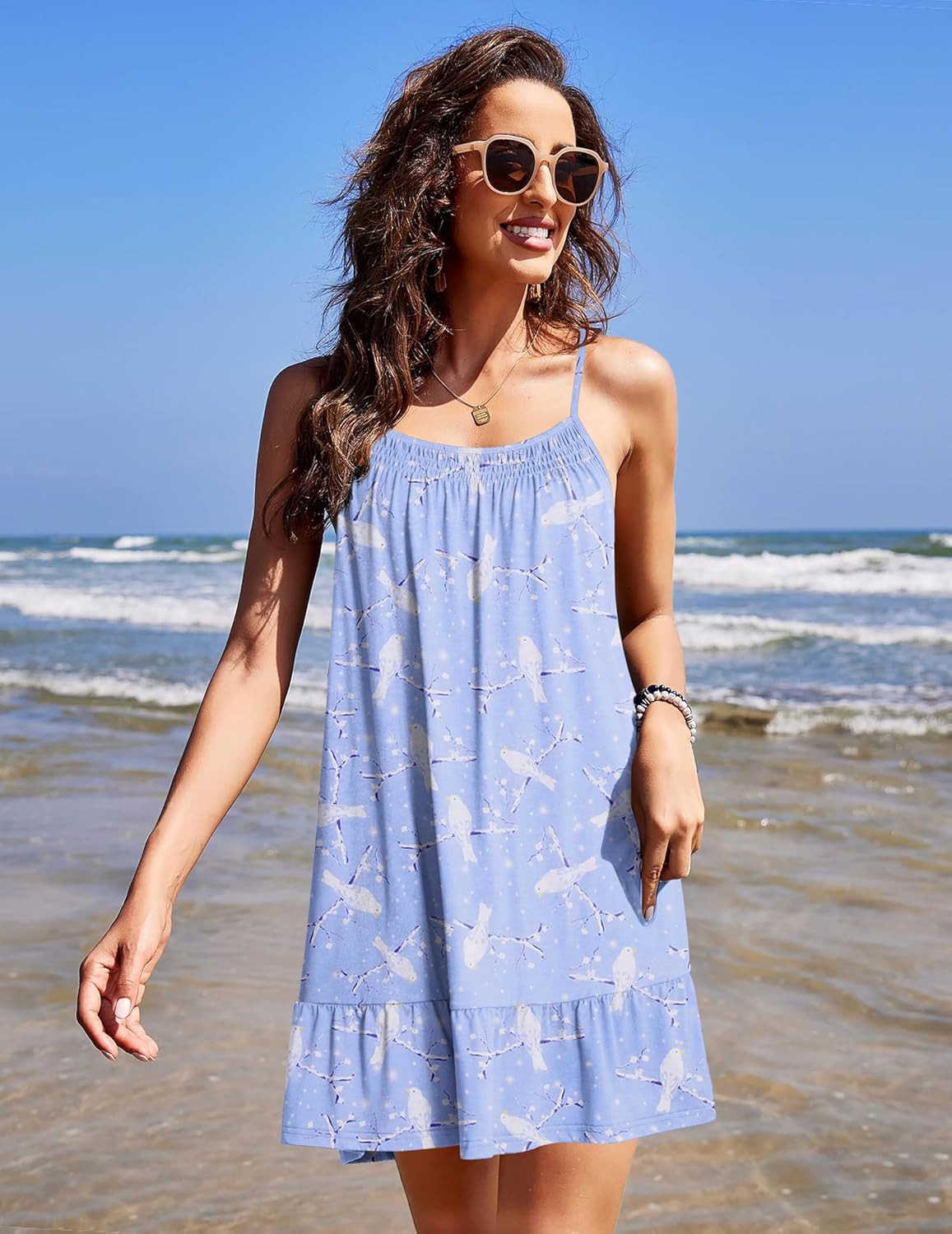 Light blue sleeveless sleep dress with thin straps and gathered neckline