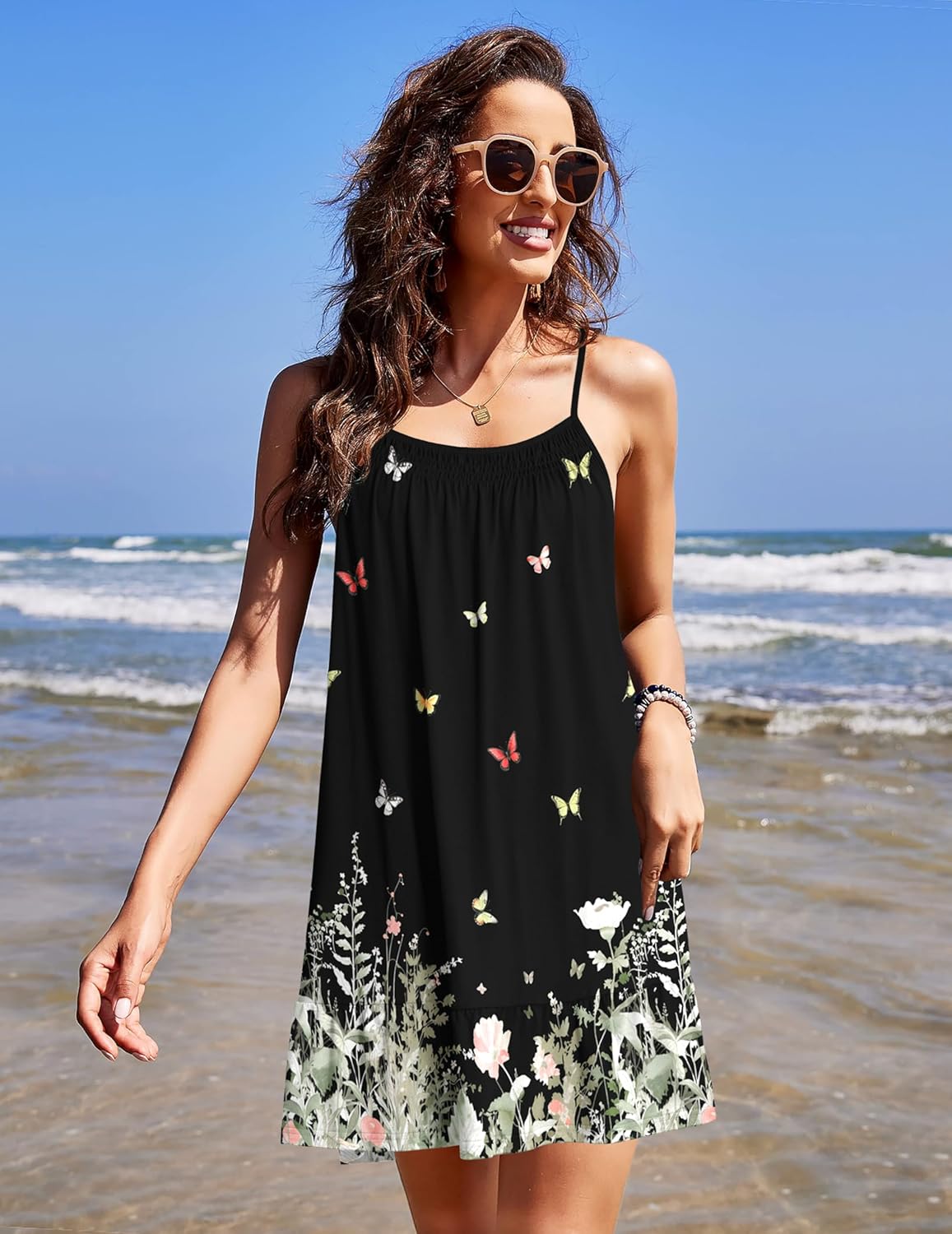 Sleeveless sleep chemise with black floral print and scalloped hem