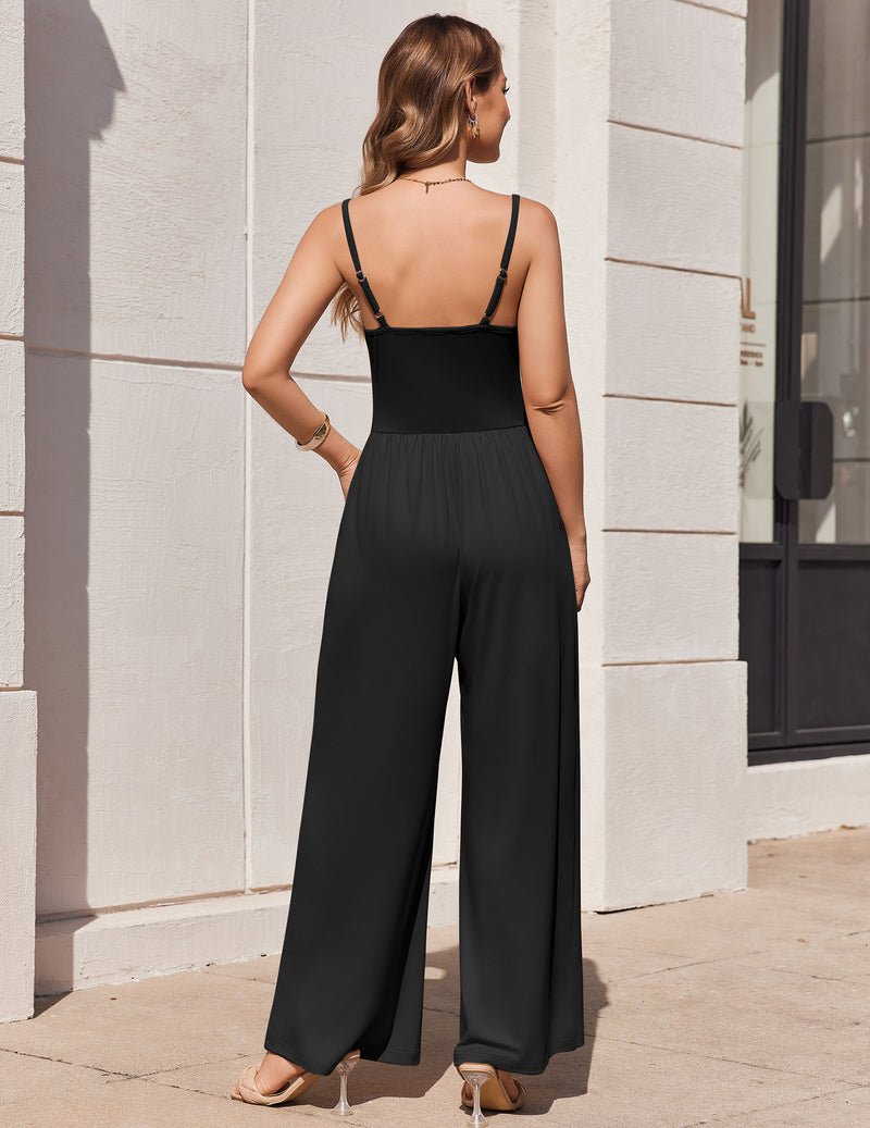 Black back view jumpsuit with thin straps, wide-leg trousers, and gathered waist