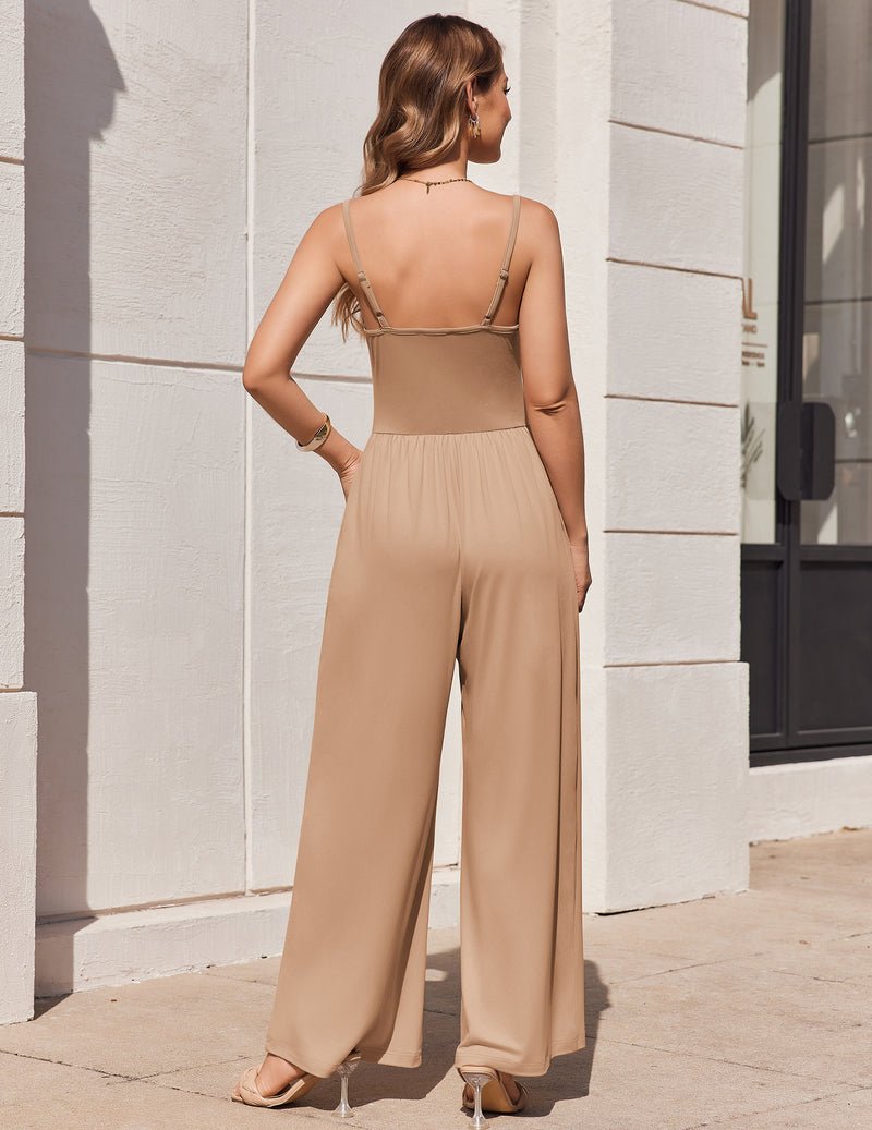 Khaki beige back view jumpsuit with thin straps and flowy wide pant legs