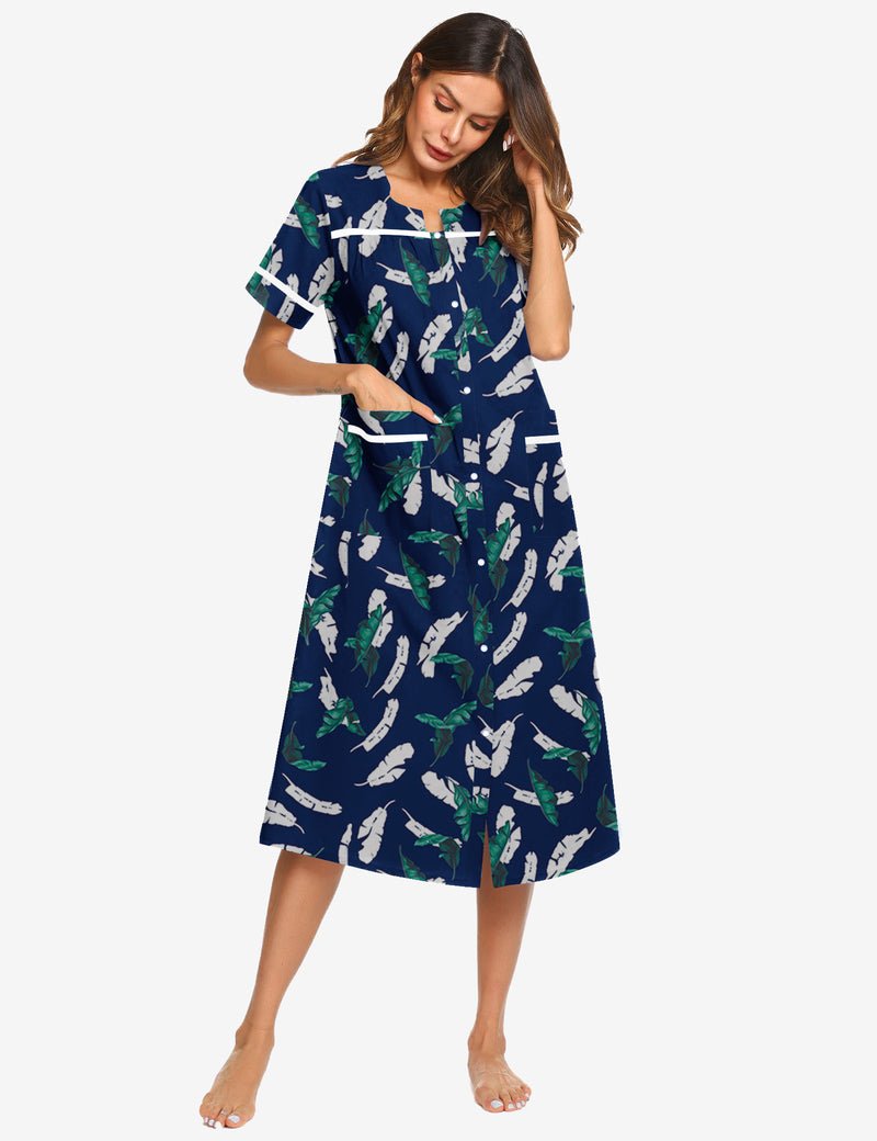 Navy cotton snap-front nightgown with green-and-white leaf pattern and side pockets
