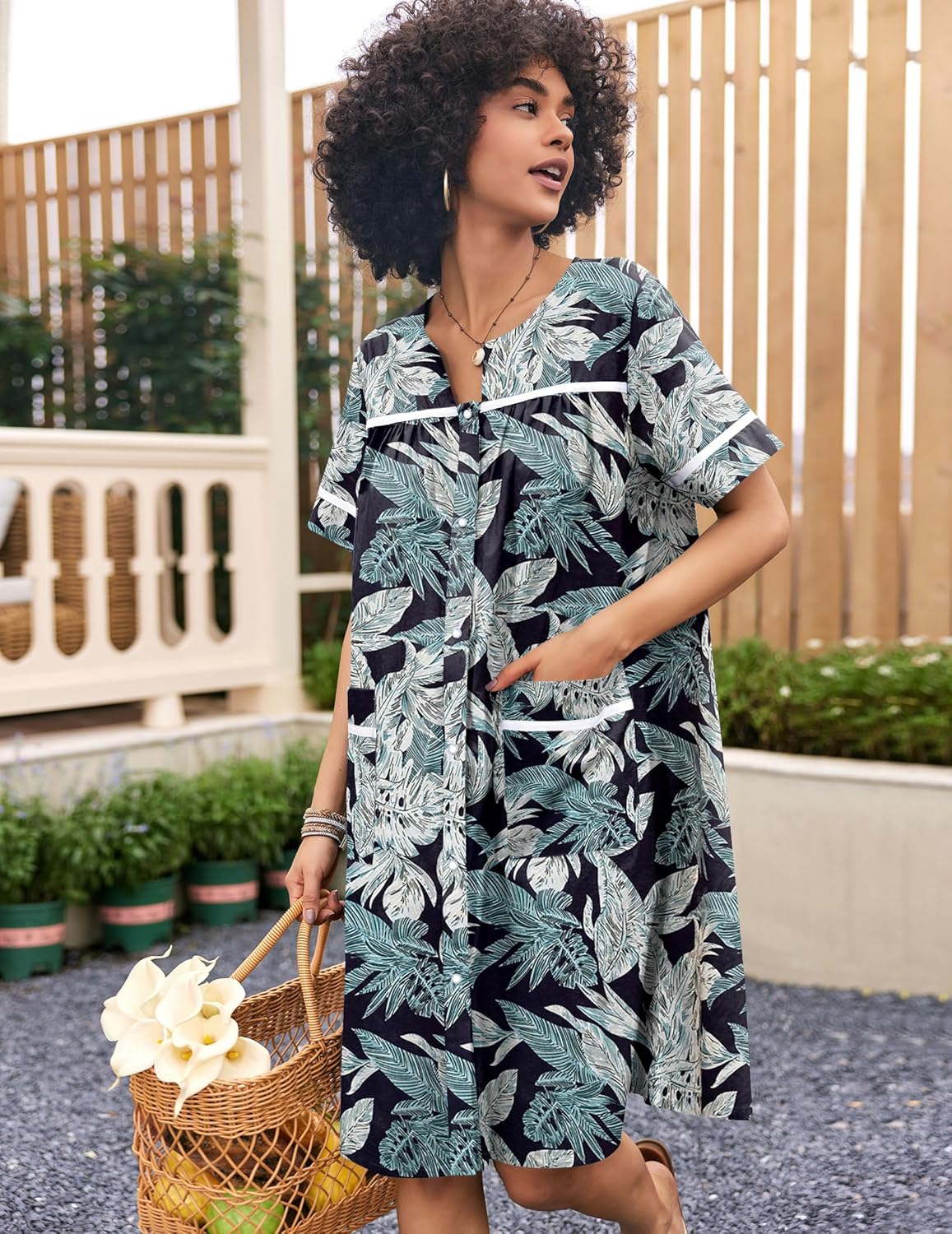 Teal and navy floral leaf-print cotton house dress with snap front and pockets