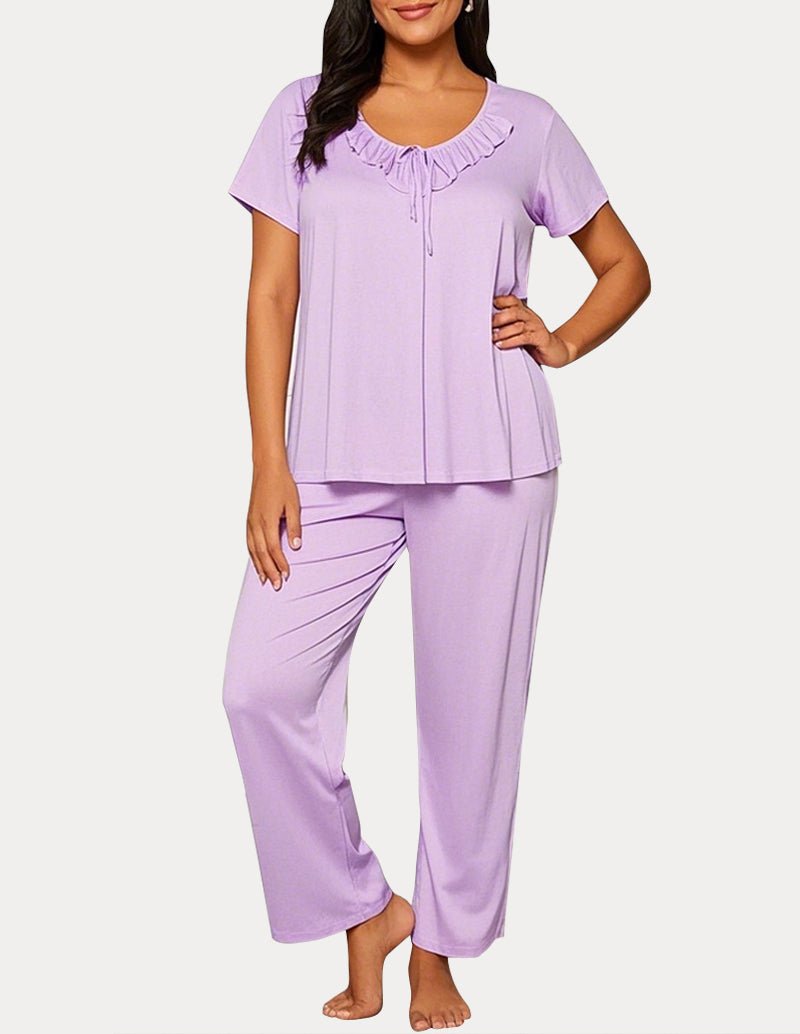Lavender pajama set: short-sleeve top with ruffled neckline and drawstring; cropped pants