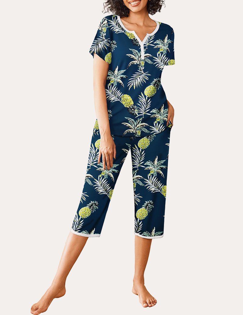 Navy tropical leaf printed pajama set, short-sleeve henley top and cropped capri pants