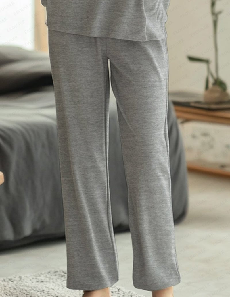 Light grey pajama pants with wide legs and ankle-length straight hem