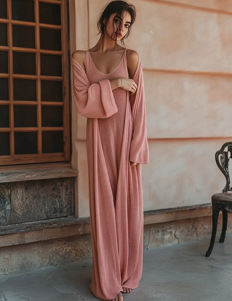 Pink draped lounge set with spaghetti-strap maxi dress and matching wrap over arms