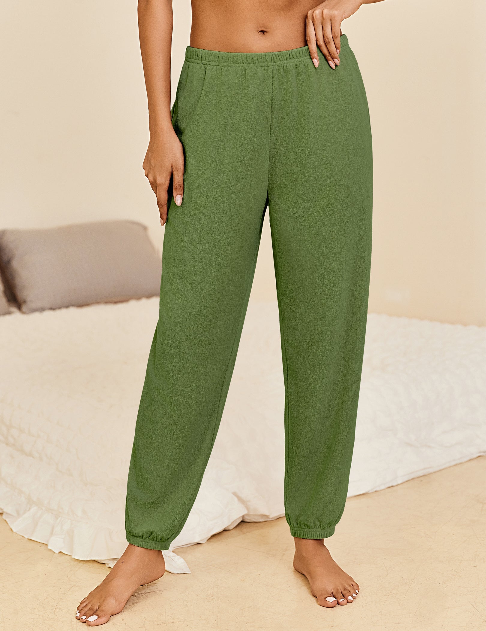 Army green lounge pants with elastic waistband and cuffed ankle hems, relaxed fit