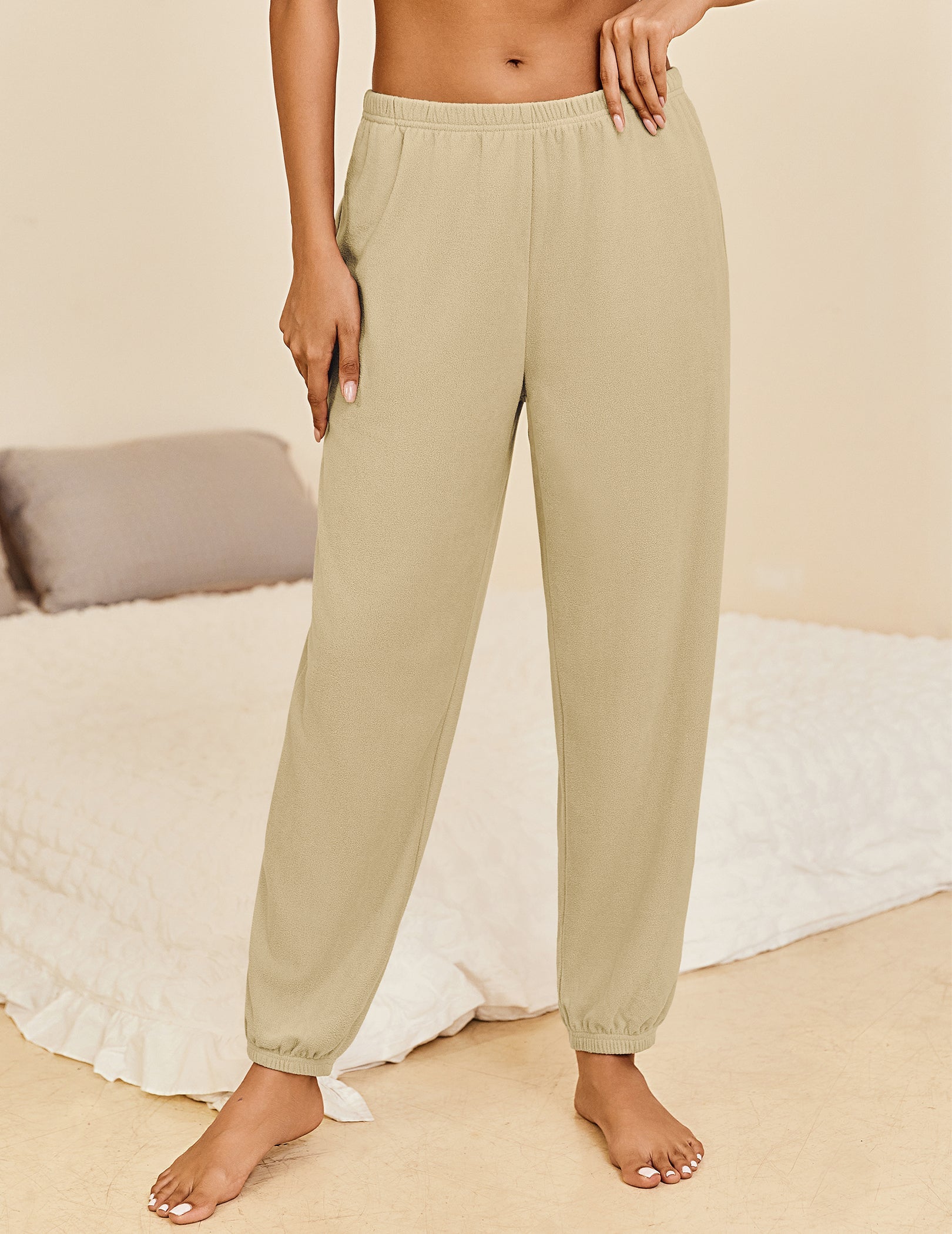 Khaki lounge pants with elastic waistband and cuffed ankle hems, relaxed fit