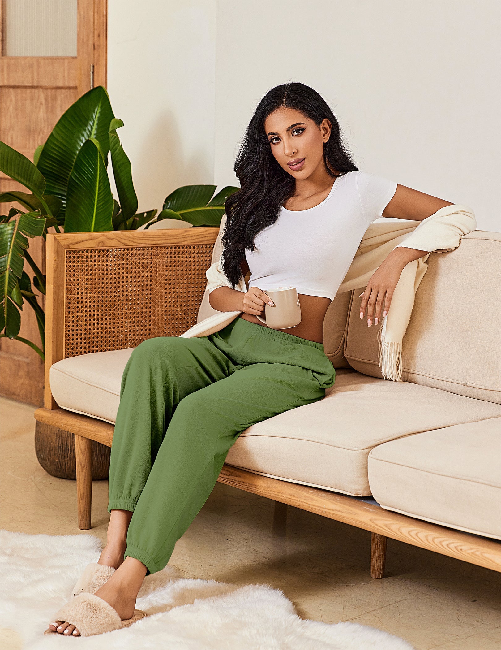 Army green lounge pants with cuffed hem and soft drape