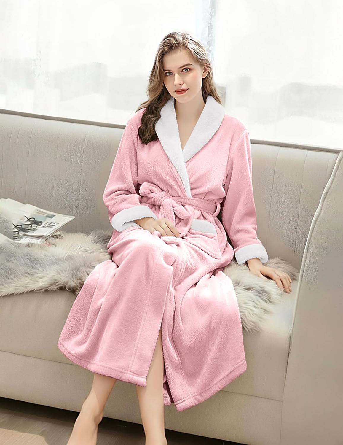 Long fleece bathrobe in light pink with white shawl collar and belt tie