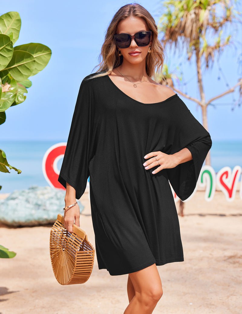 Black V-neck batwing nightshirt dress with wide draped sleeves