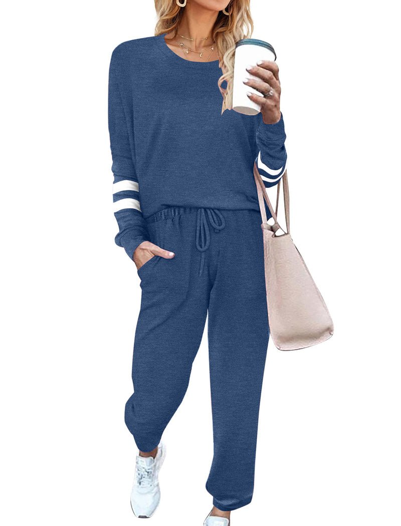 Navy-blue 2-piece pajama set with long sleeves, striped cuffs, drawstring jogger pants