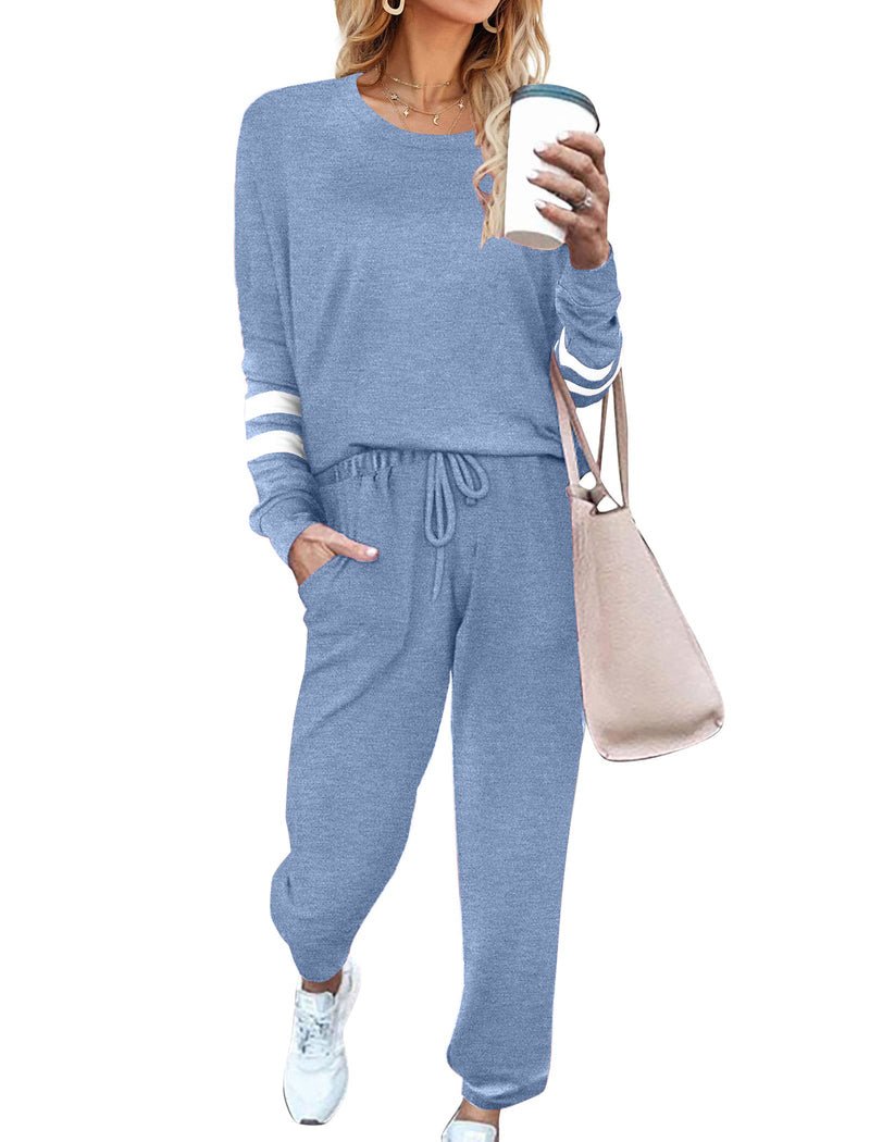Light blue 2-piece pajama set with long sleeves and white striped cuff details