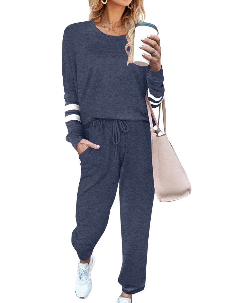 Navy 2-piece pajama set with long sleeves and drawstring jogger pants, striped sleeve cuffs