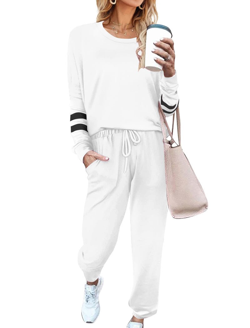 White 2-piece pajama set with long sleeves, striped cuffs, and drawstring jogger pants