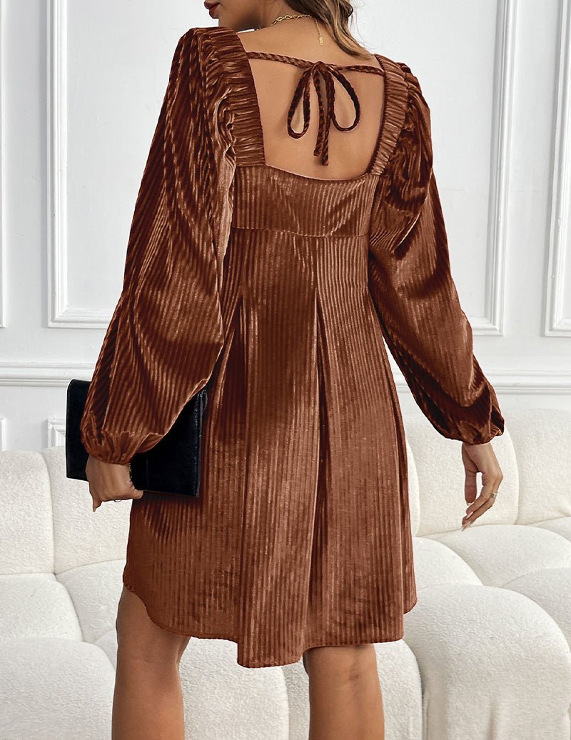Brown long-sleeve A-line dress with square back cutout and bow tie detail