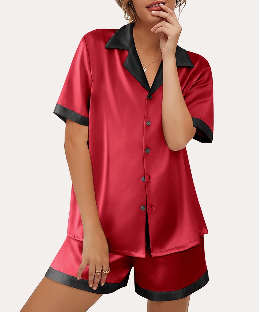 Red satin button-down pajama set with short sleeves and matching shorts