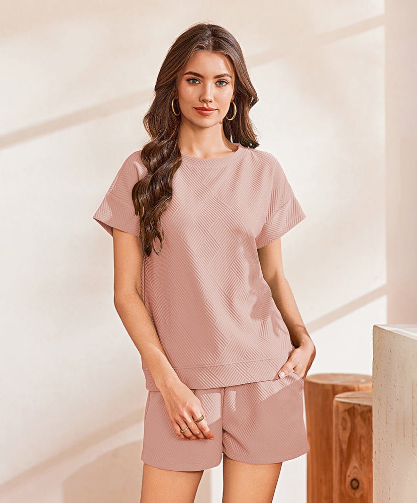 Pink textured lounge set with short-sleeve top and drawstring shorts