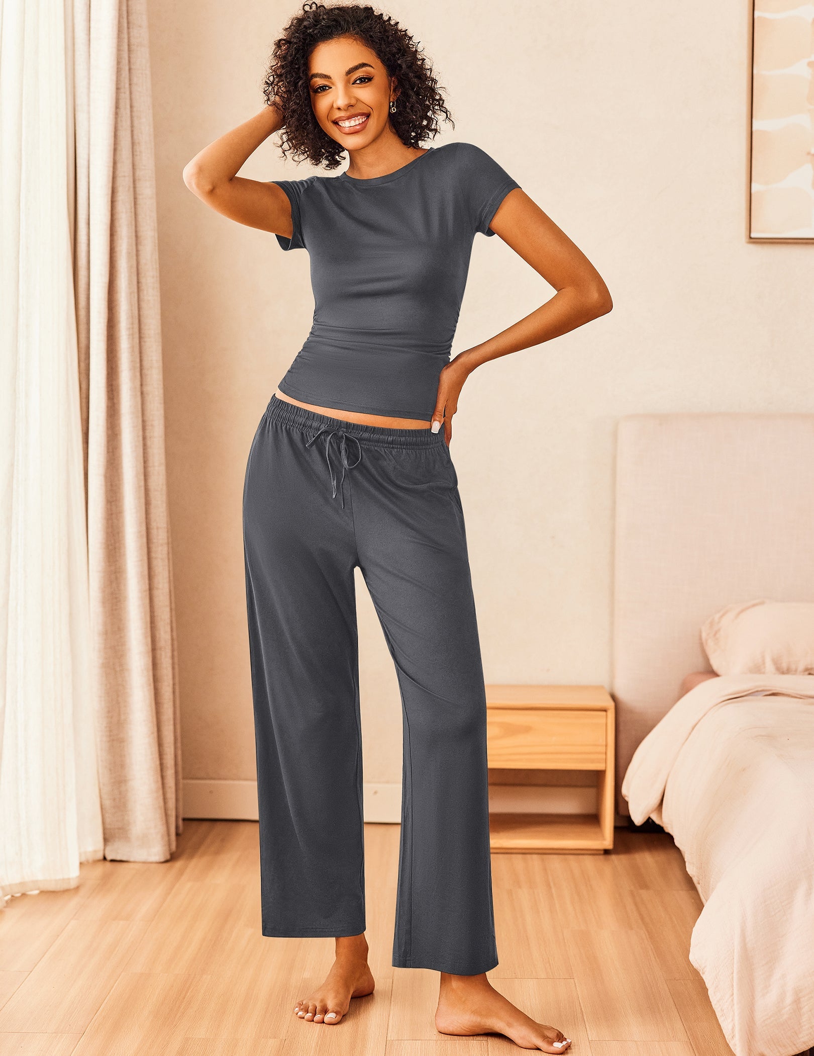 Super-soft lounge set in dark grey: short-sleeve top and wide-leg drawstring pants.