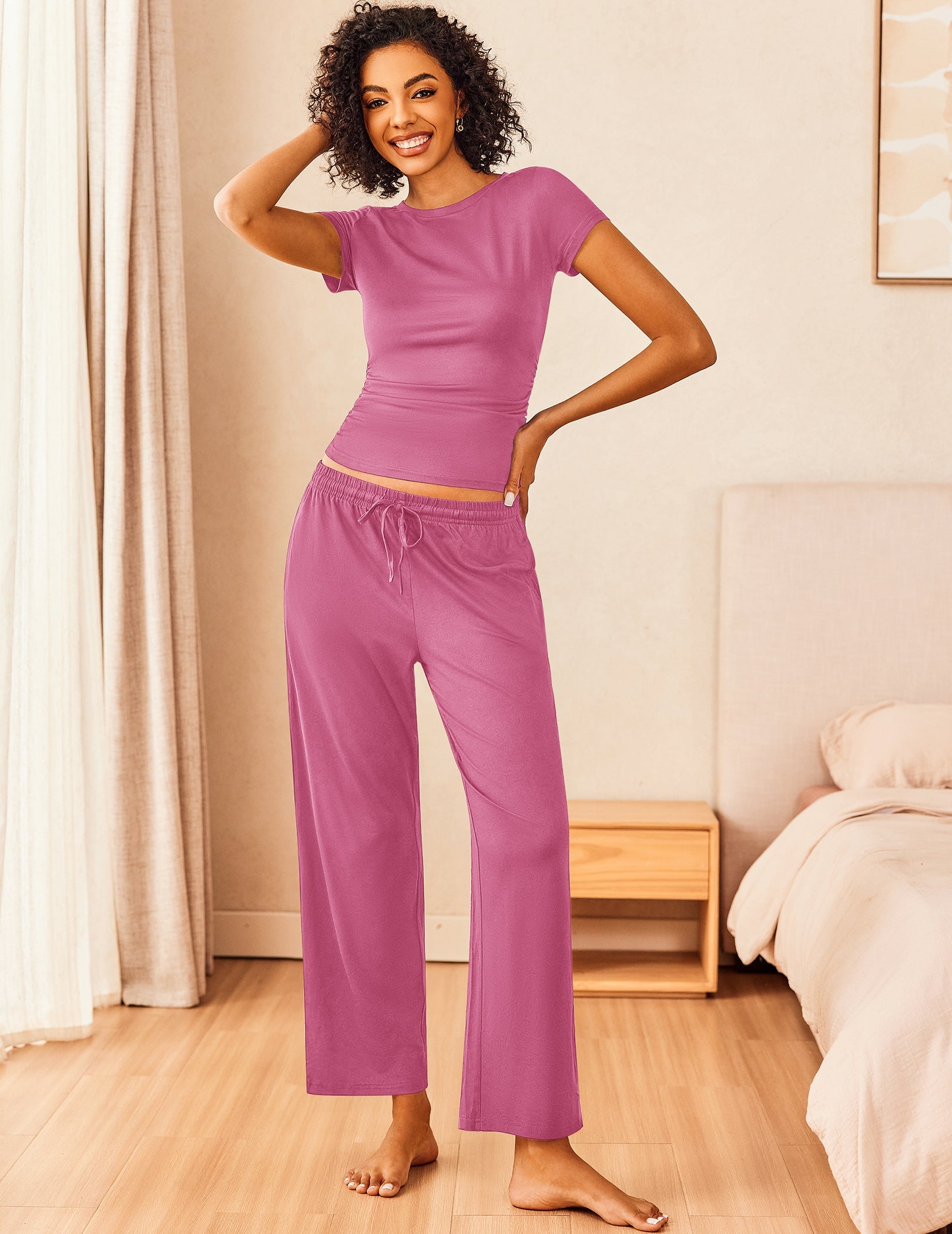 Super-soft lounge set in pink: short-sleeve top and wide-leg drawstring pants.