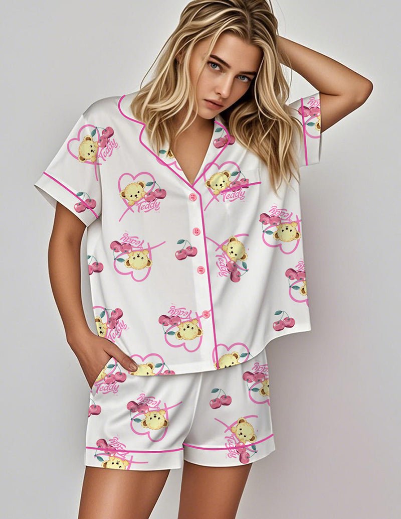 Satin pajama set: white short-sleeve button top and matching shorts with teddy print