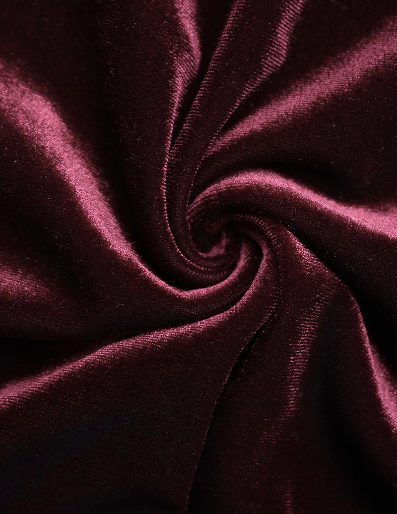 Wine red satin fabric close-up with soft sheen and gathered texture