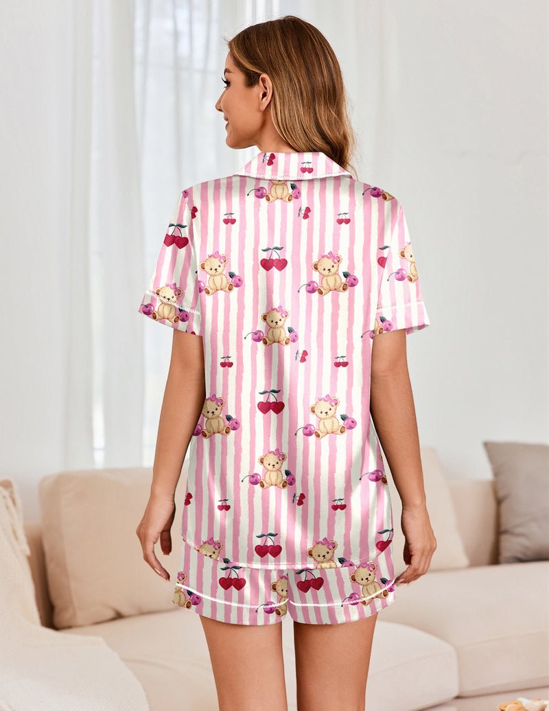 Back view of pink striped satin pajama set with teddy and heart prints, short sleeve top