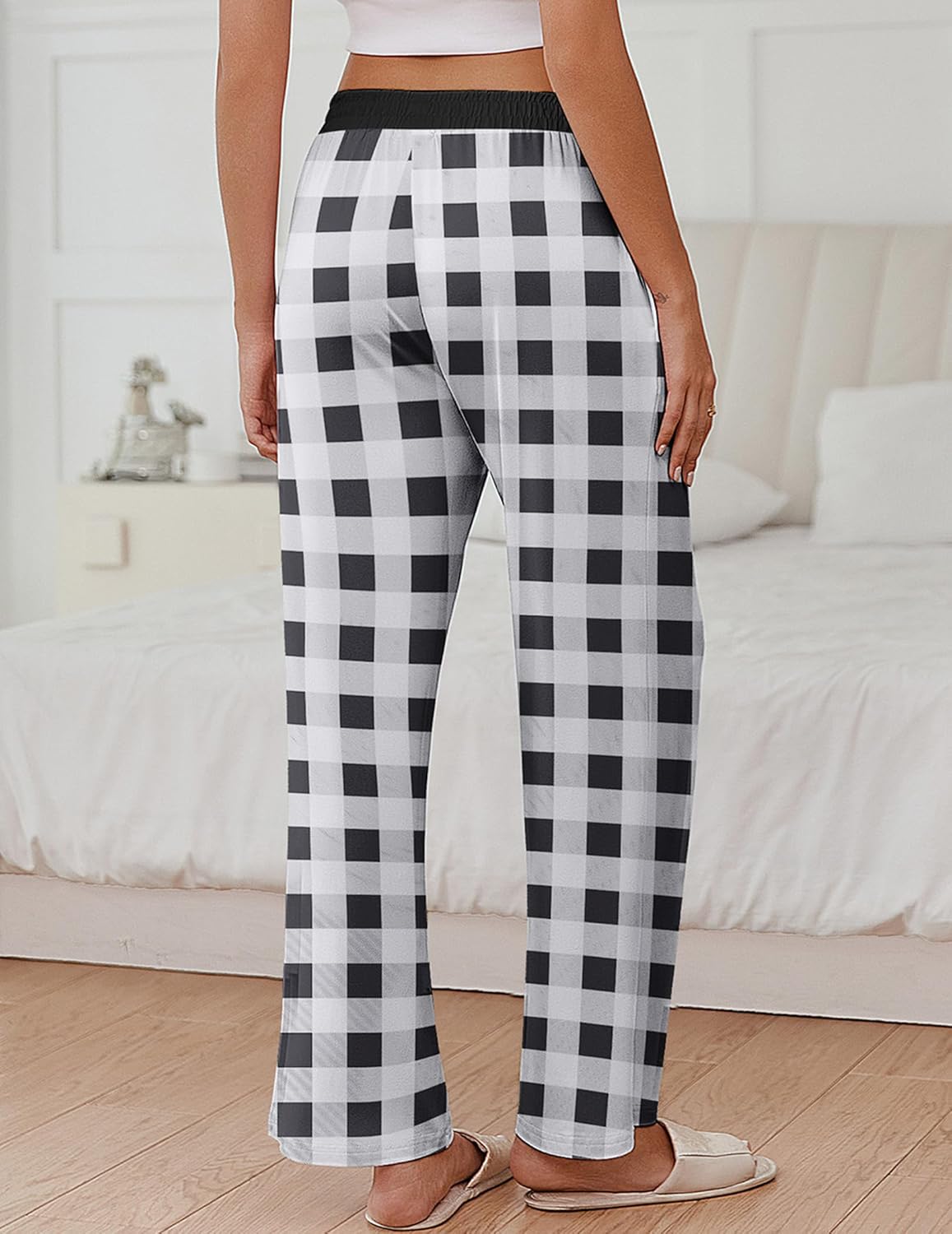Black-and-white plaid pajama pants with wide legs and elastic waistband
