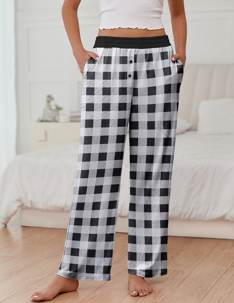 Teddy pajama pants in black and white plaid with elastic waistband and wide-leg cut