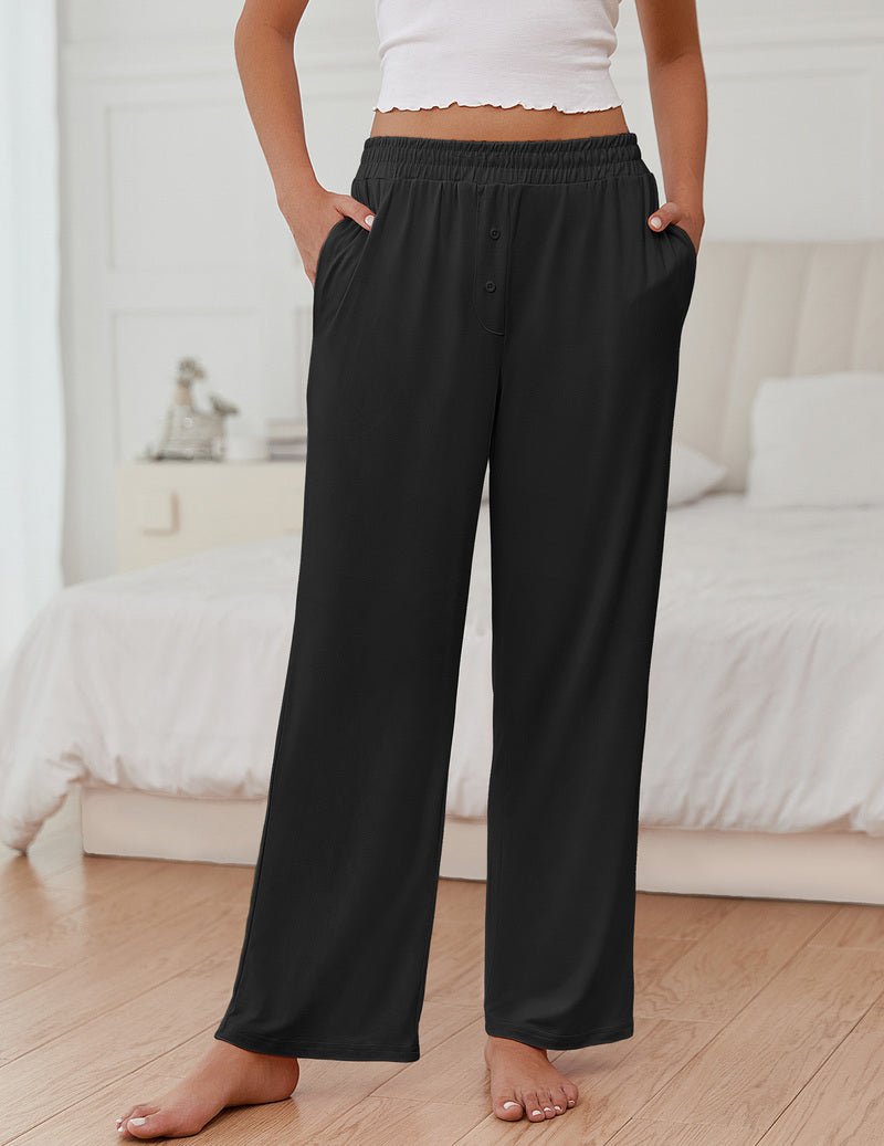 Women's black pajama pants with elastic waistband and wide, flowy legs