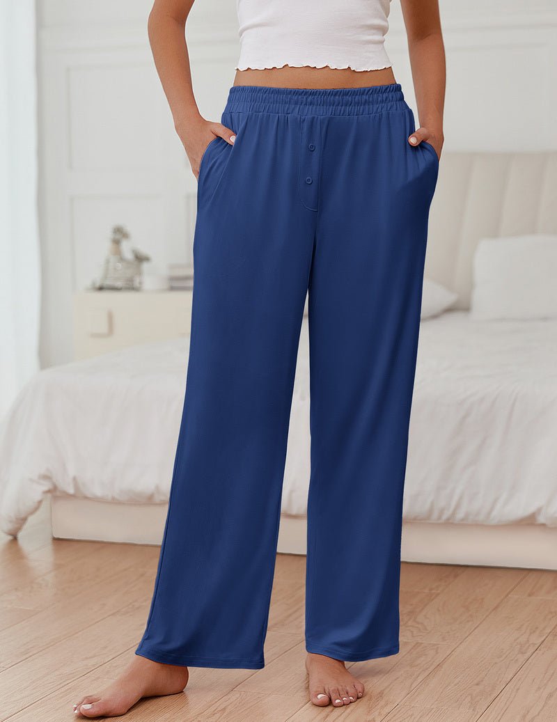 Women's blue pajama pants with elastic waistband and wide-leg silhouette