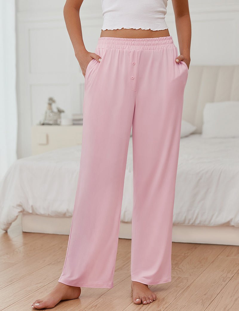 Teddy pajama pants in light pink with elastic waistband and relaxed wide-leg silhouette