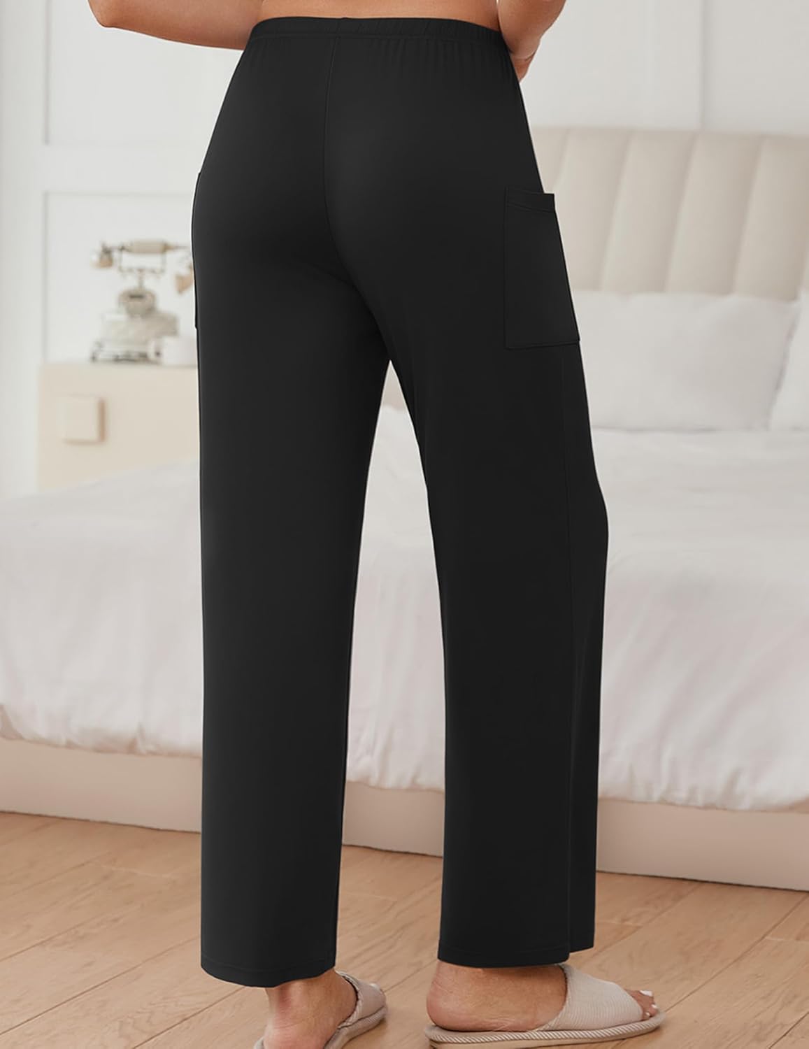 Black sleep pants with side pocket, straight wide legs and elastic waistband