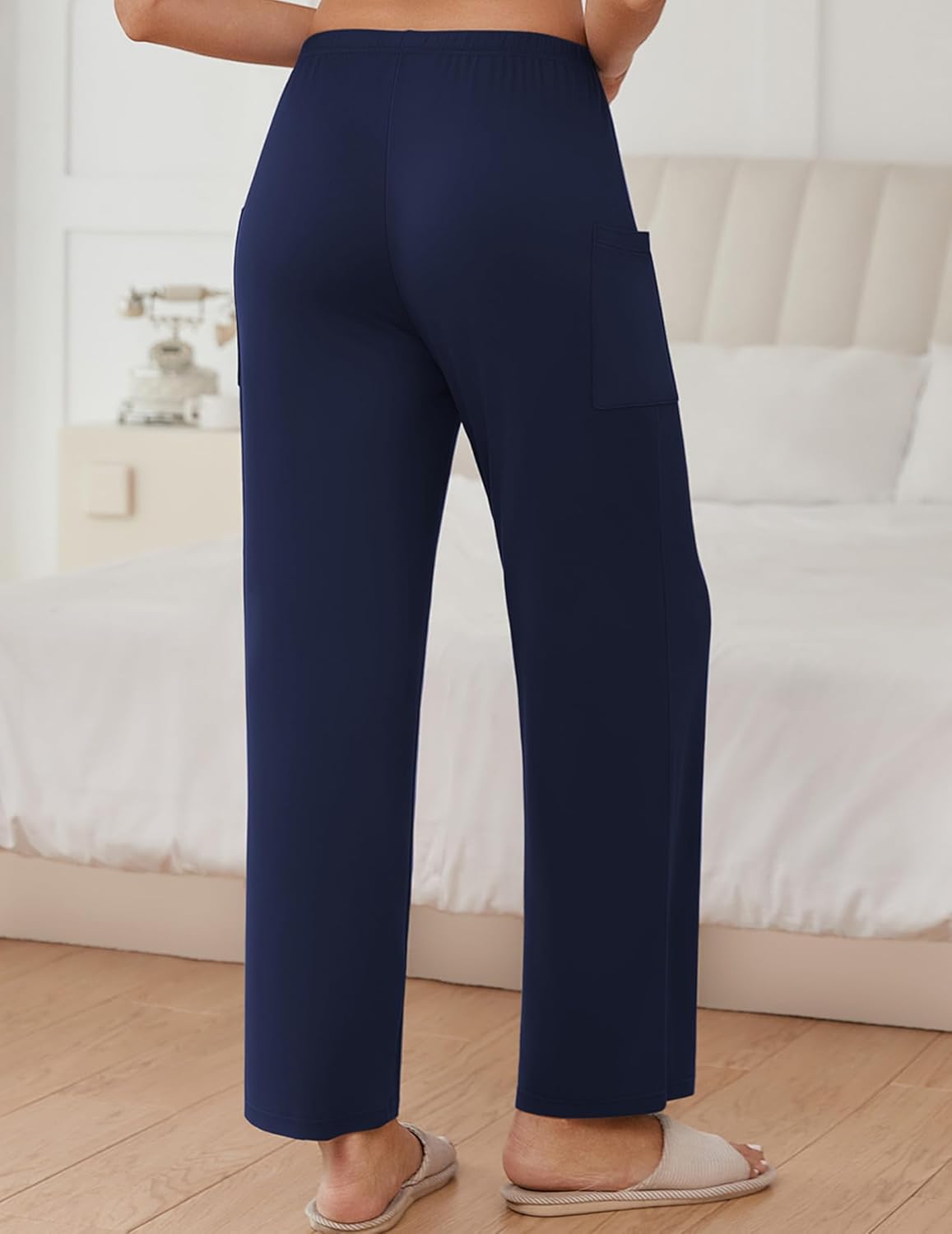 Navy wide-leg pajama pants with elastic waist and side pockets, ankle-length