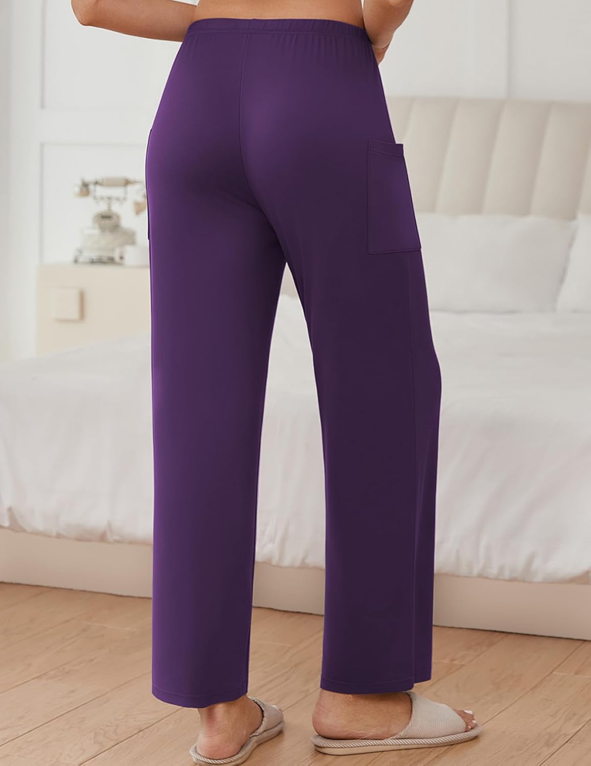 Solid purple teddy pajama pants, elastic waist and side pocket detail, drapey straight fit