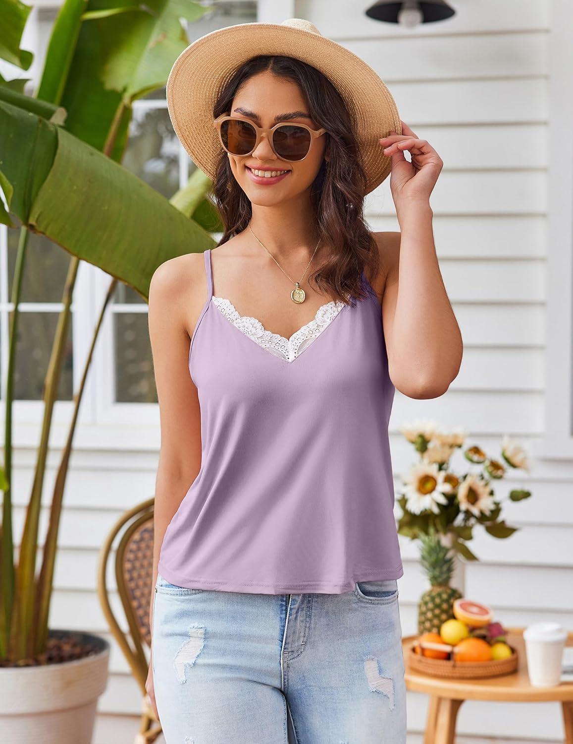 Purple camisole pajama set with lace V-neck and matching short bottoms
