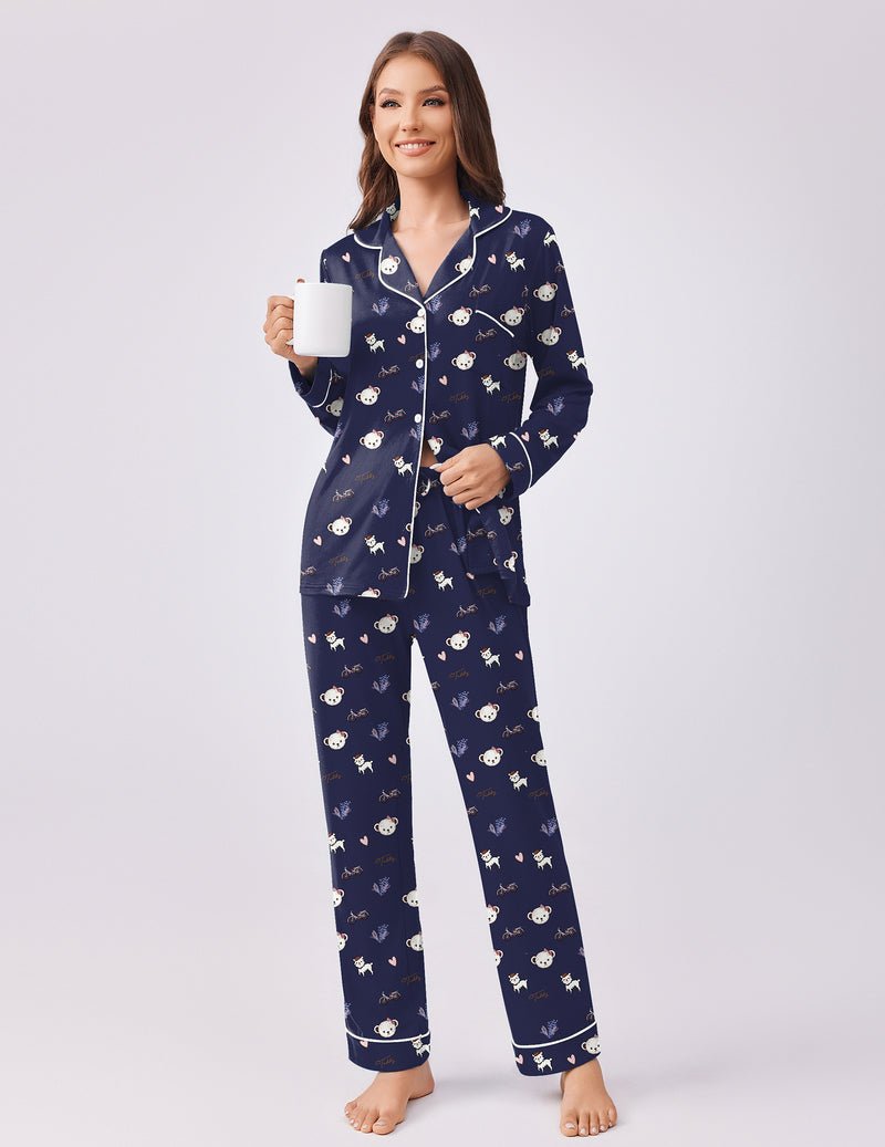 Navy blue teddy pajama set, zip-button style top with all-over teddy pattern and long pants.
