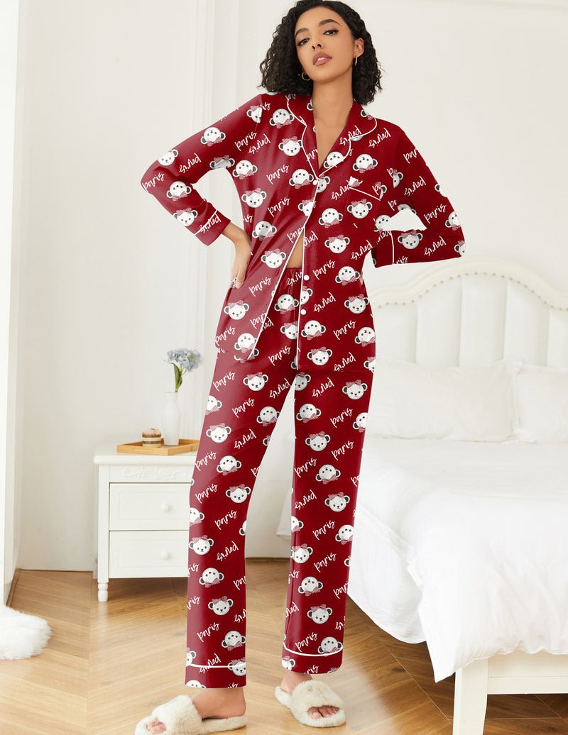 Red teddy pajama set with all-over teddy prints; button-front top and long matching pants.