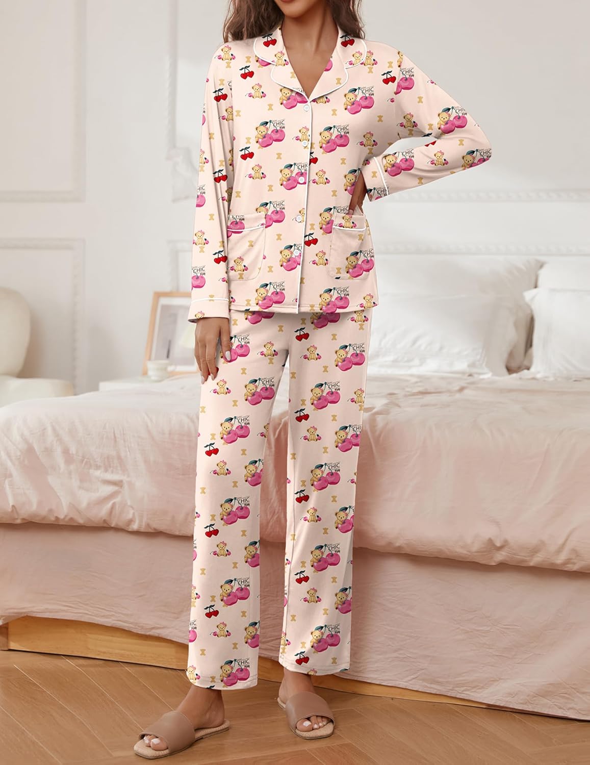 Teddy print pajama set, cream with pink characters; long sleeves and matching trousers
