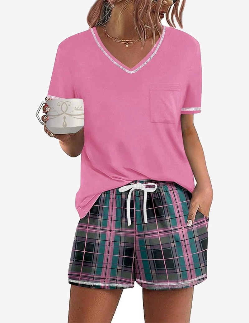 Pink short-sleeve pajama set with V-neck top and green plaid drawstring shorts