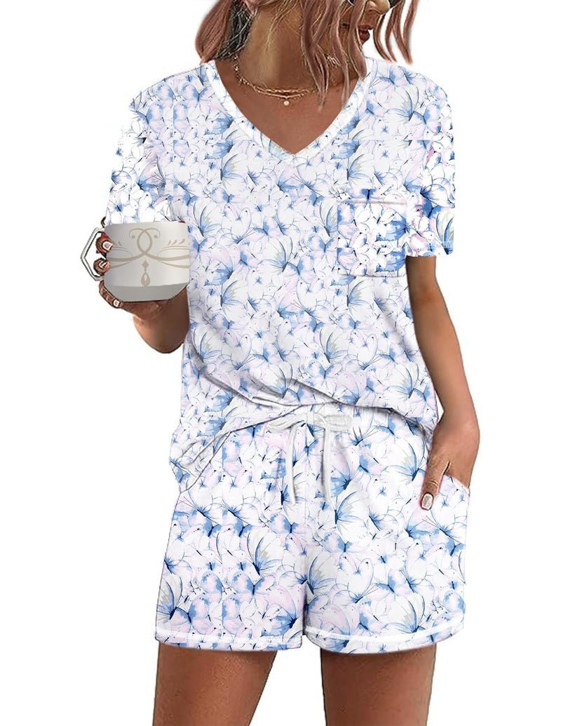 Light blue short-sleeve pajama set with V-neck top and all-over floral shorts