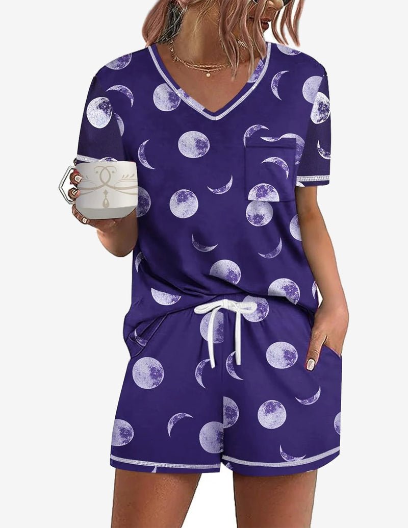 Purple short-sleeve pajama set with V-neck top and moon print drawstring shorts