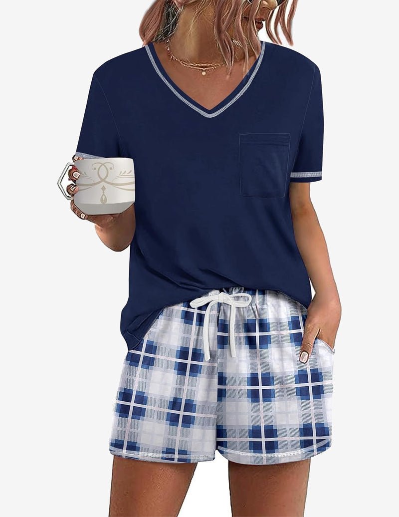 Navy short-sleeve pajama set with V-neck top and blue plaid drawstring shorts