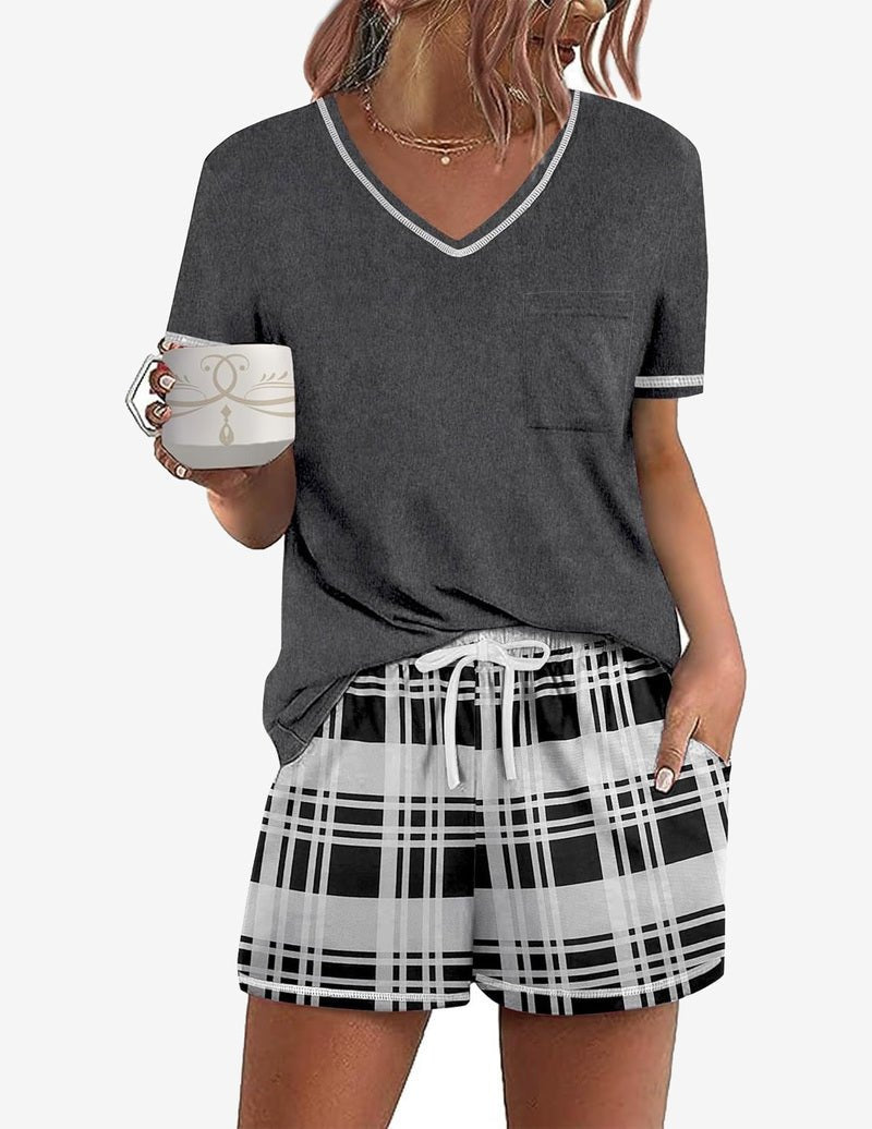 Black short-sleeve pajama set with V-neck top and white plaid drawstring shorts