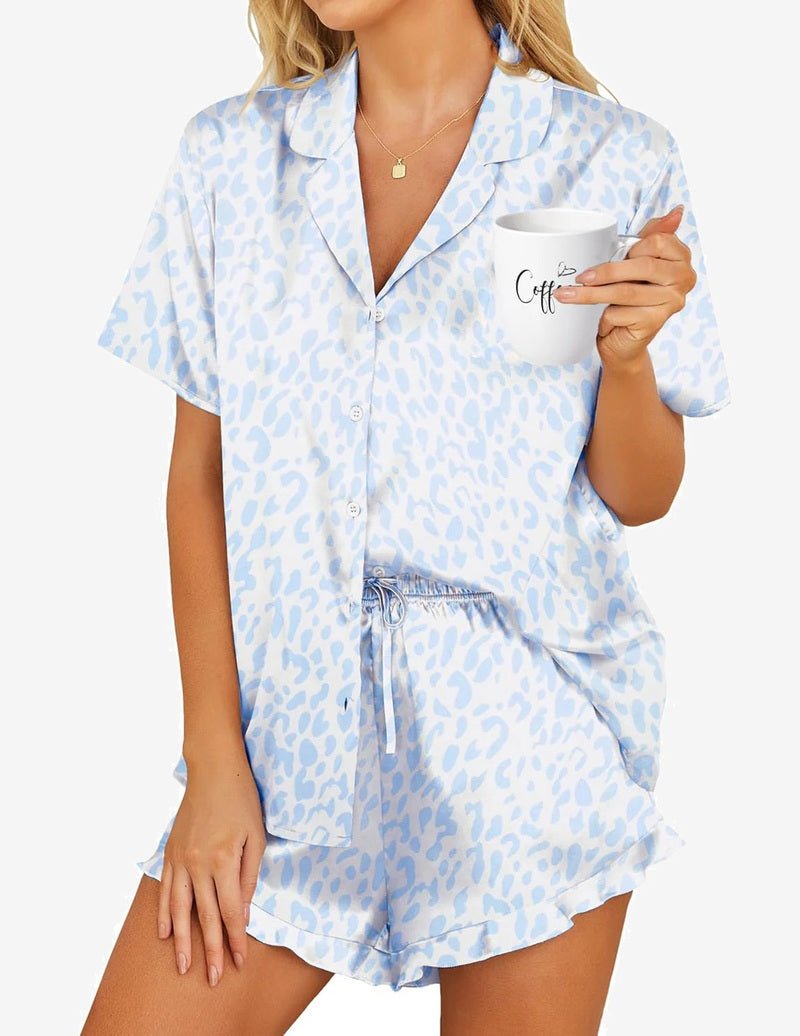Light blue leopard-print satin pajama set with button shirt and matching drawstring shorts