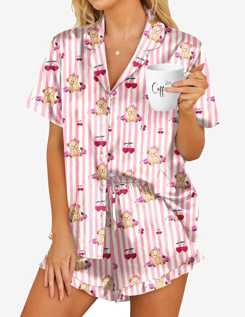 Pink striped satin pajama set with teddy and bow print, button front and shorts