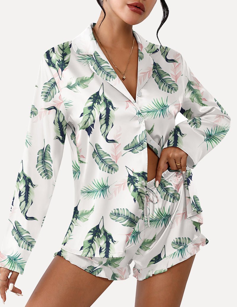 Satin pajama set with button-front long sleeves and ruffled leaf-print shorts.