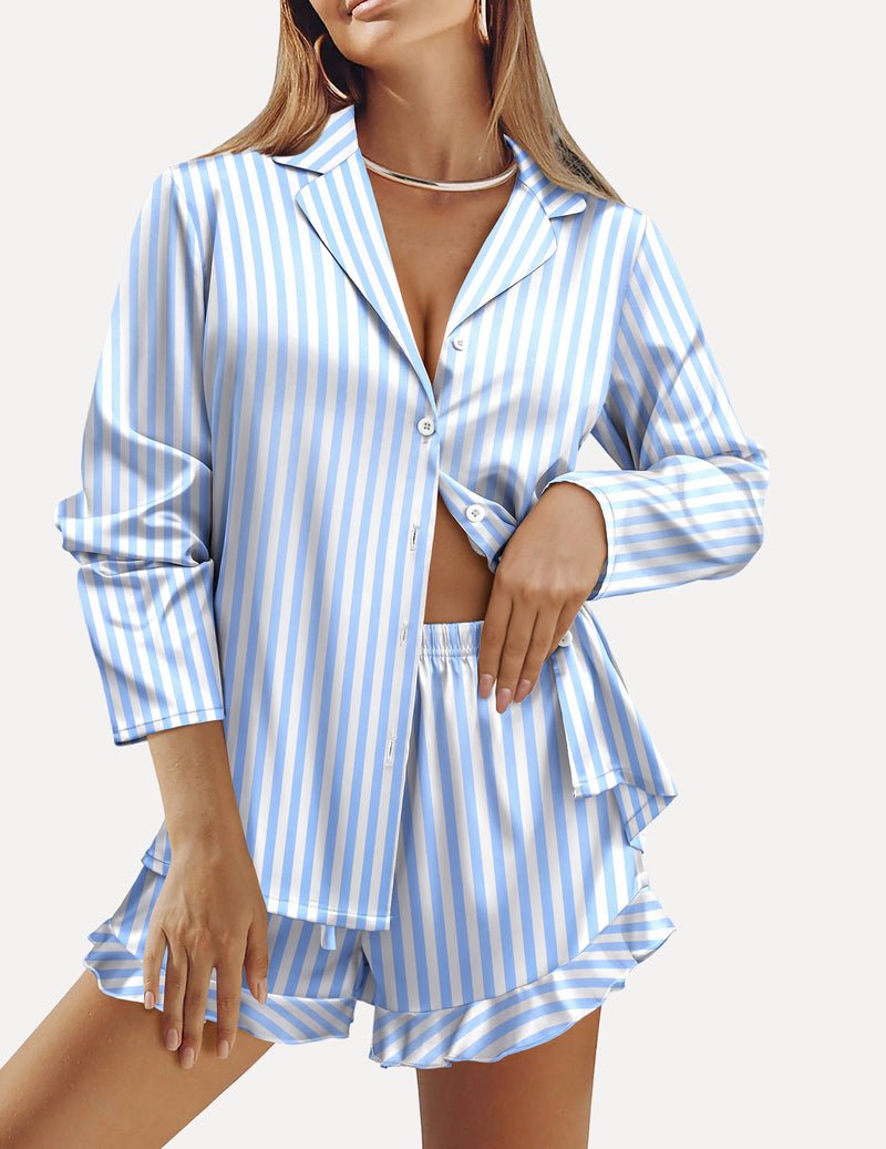 Satin pajama set with button-front long sleeves and ruffled blue-and-white striped shorts.