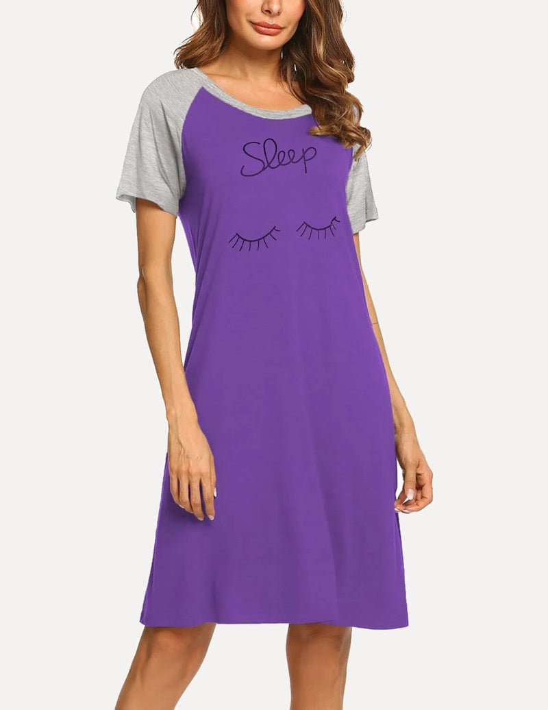 Purple short-sleeve nightdress with “Sleep” text and eyelash graphic